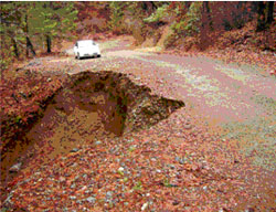 Slip-outs create road hazard and dump sediment into the Trinity River Slip-outs create road hazard and dump sediment into the Trinity River