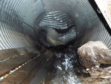 Interior view of collapsed culvert Interior view of collapsed culvert