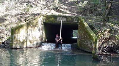 Box culvert with jump prevents migration of fish and cannot accomodate large storm flows Box culvert with jump prevents migration of fish and cannot accomodate large storm flows