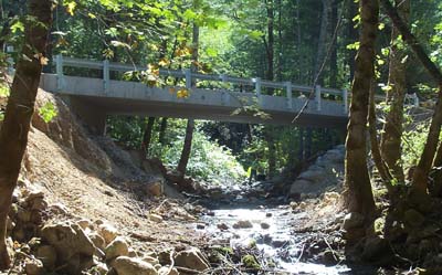 New bridge allows for fish passage and increased storm volume New bridge allows for fish passage and increased storm volume